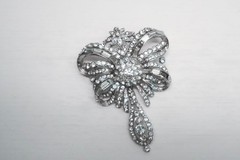Vintage brooch Gablonz rhinestone bow silver-toned 6.5 cm.
