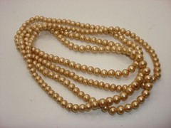 VINTAGE “Andrea” CHAMPAGNE FAUX PEARL NECKLACE 56″ IN O.B.!