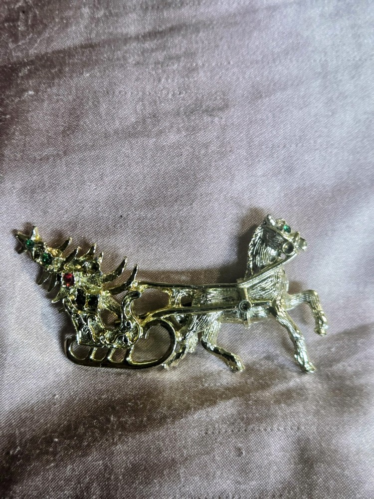 Gold-tone Reindeer & Sleigh And Tree Brooch with Colored Rhinestones