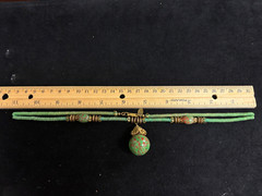MIRIAM HASKELL UNIQUE GREEN GLASS 22″ NECKLACE WITH GOLD TONE METAL