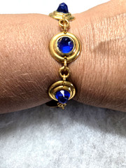 Vtg gold tone rib disc blue faucet rhinestone cab Bracelet