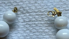 Vintage “MONET” gold-tone and white beaded necklace with gold tone spacers