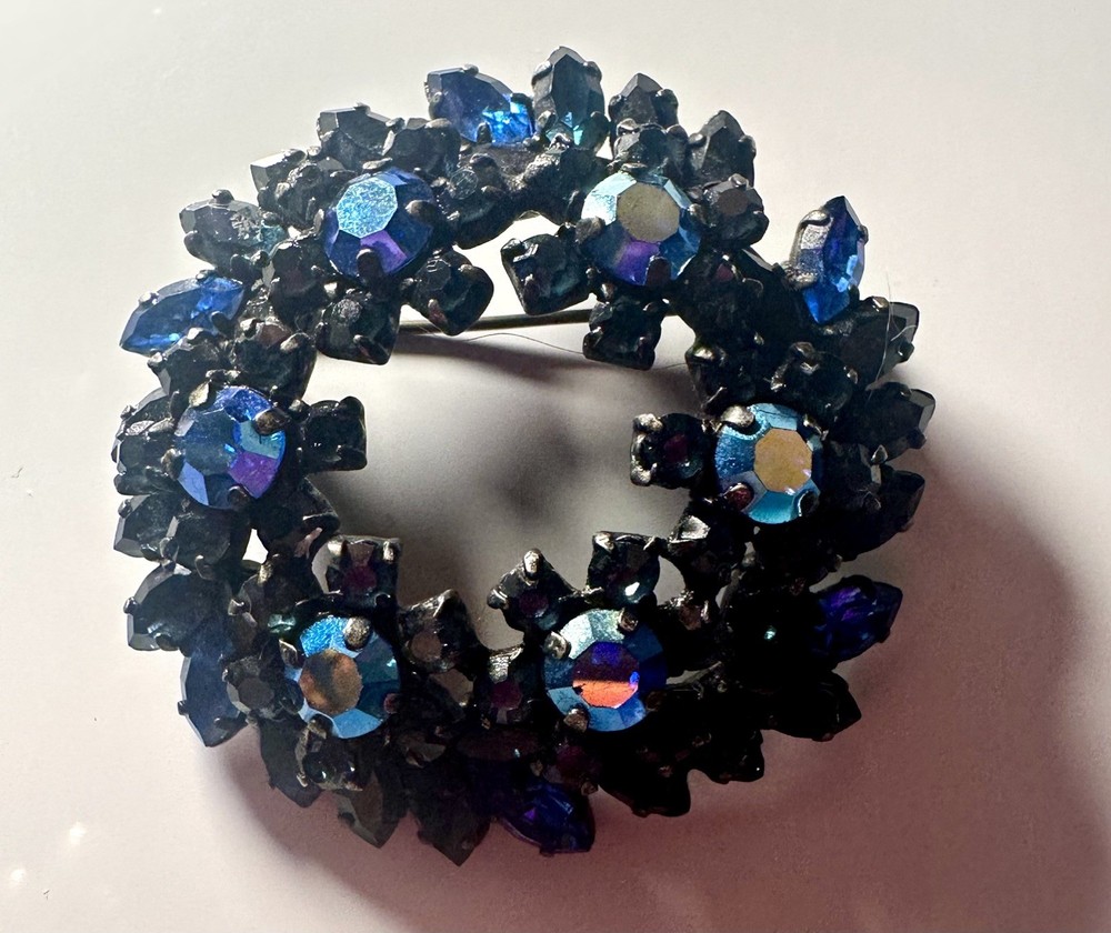 VTG Dark Blue Austrian Crystal Wreath Brooch Stamped Made in Austria Black Metal