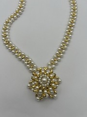 Vintage Necklace Of Gold-tone Beads With Faux Pearls And A Snowflake Pendant