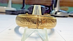 BEAUTIFUL GOLD LOOKING BRACELET .ENGRAVED CLASSIC WRIST BAND. IT IS NOT GOLD