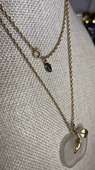 Vintage Avon frosted glass apple pendant on a gold-tone chain
