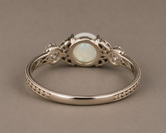 Handcrafted White Ethiopian Opal Ring with Moissanite Accents & Vintage Leaf