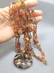 Multi-strand piece amber-toned Glass Gemstone Beads, large round pendant 26in.