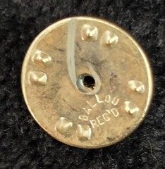 B.A. Ballou & Co., indicated by the “BALLOU REG’D” Letter “N” lapel pin VINTAGE