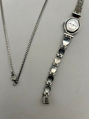 Delicate silver plated metalwork w pink and white stones in floral arrangement