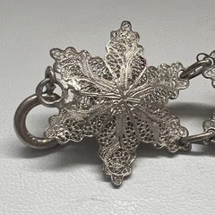 Antique Silver Bracelet featuring Finely detailed Filigree Flowers