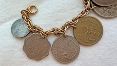 VINTAGE COIN CHARM BRACELET 11 INT COINS