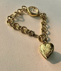 vintage Gruen Gold-Tone Charm Bracelet Watch.