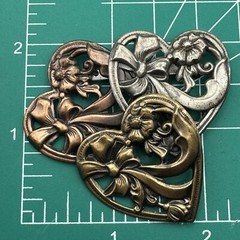 K&T Signed Triple Heart Tiered Goldtone Silvertone Copper Colored Brooch Pin