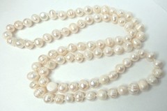 OVER 80 PIECES OF FRESHWATER WHITE PEARL 10MM, NECKLACE 32″ LONG