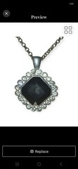 Vintage Art Deco Faux Onyx Pendant Framed by a Halo of Clear Stones.