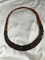 18″ Amber Necklace With Magnetic Clasp.  Width varies from 3/16″ to 3/4″.  
