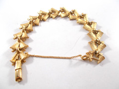 VTG 1960’s Gold Tone Puccini Textured V-Link Bracelet with Safety Chain