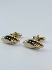 Vintage Swank mens cufflinks torpedo shaped raised cutout design gold tone 3/4″
