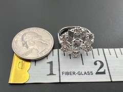 VINTAGE 1950’S 1.2TCW H-SI2 ROUND BRILLIANT CUT DIAMOND FLOWER COCKTAIL RING