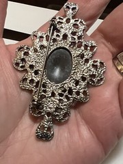 SILVERTONE VINTAGE BROOCH WITH FAUX ONYX