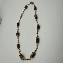 Vintage Glass Beads and Gold Tone Necklace. It’s 18” long. See pics.