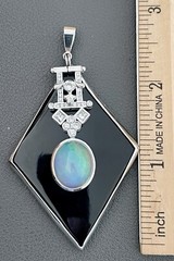 Platinum 8.5CT Opal, 0.60CTW Diamond & Onyx Pendant(BU34)