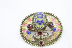Antique Egyptian Revival winged scarab brooch featuring vibrant enamel work