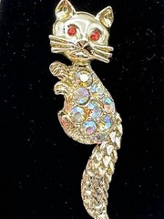 Bejeweled Feline Brooch Gold Tone With Man Made Aurora Borealis And Red Stones