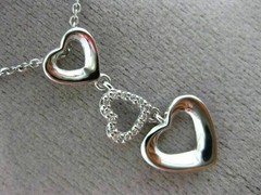 ESTATE .06CT DIAMOND 14KT WHITE GOLD 3D OPEN TRIPLE HEART FLOATING LOVE PENDANT