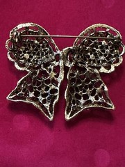 Vintage Weiss Bow Brooch Pin Green Rhinestone Irradiated