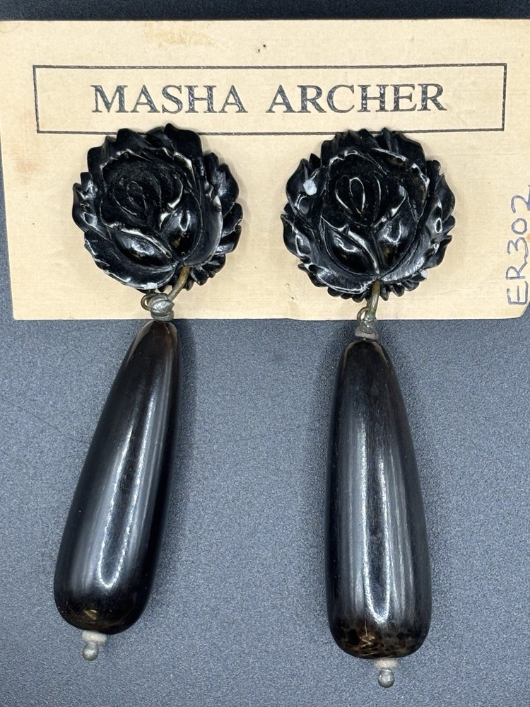 VTG MASHA ARCHER HAND CARVED ROSES/COW BONE. DANGLES OF TINTED BUFFALO HORN.