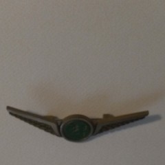Stoffel Seals Signed Wing Brooch Pin Gold Tone Green Round Bezel Center