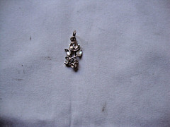 VTG 1970-80s SMALL 3D FLOWER W/ DIAMOND CUTS STERLING SILVER STAMPED 925 PENDANT