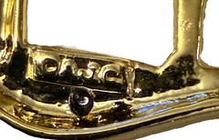 AJC Gold Toned Girl With Golf Club Wrapped Around A Tree Signed Brooch