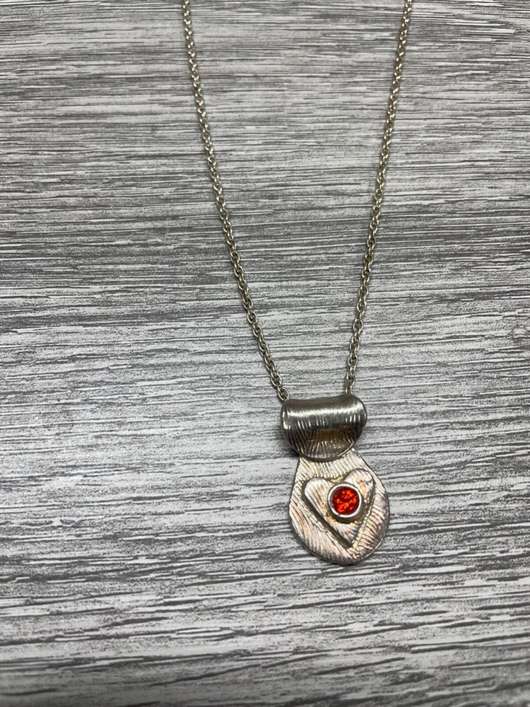Metal Pendant red gemstone in middle of Heart 1″ x 1/2″ no chain vintage