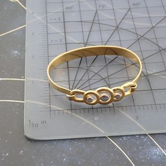 Vintage Crown Trifari Gold Silver Tone 6 1/4″ Petite Tension Bangle Bracelet
