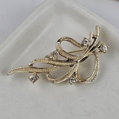 Vintage Gerry’s Gold Tone Rhinestone Ribbon Brooch Pin
