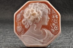 Vintage shell cameo “Girl with a flower hair ornament”, (65.0ct) sign by artist.
