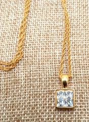 Vtg Givenchy Gold Tone Sm Pendant Channel Set Cubic Zirconia Reverse Side Logo