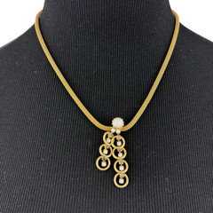 MESH gold-tone pendant necklace – vintage white milk glass & rhinestone drops