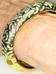 Unsigned Designer Cuff Clamper Bracelet 1980’sEmbossed Textured Hinged Goldtone