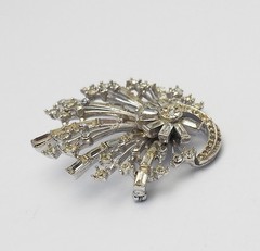 Antique silver tone metal and rhinestones sparkling swirl brooch pin