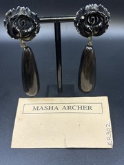 VTG MASHA ARCHER HAND CARVED ROSES/COW BONE. DANGLES OF TINTED BUFFALO HORN.