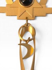 VINTAGE MATTE GOLD-TONE ABSTRACT SUN AND MOON DANGLE BROOCH