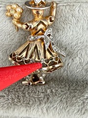 Vintage Rhinestone Brooch Figural Gold tone Woman with Flowers READ