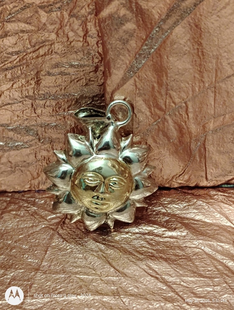 A vintage Milor Italy celestial sun faced