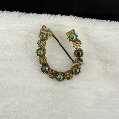 Vintage Rhinestone Horseshoe Brooch Gold Tone AB Green Sparkle