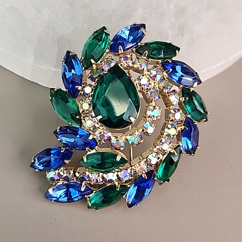 Vintage Rhinestone Brooch Blue Green AB Swirl Gold Tone 2.25″