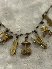 Pididdly Brass Necklace tiny Purple Glass Beads and 15 Mechanical Charms Vintage